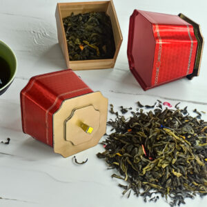 Tin can for tea packaging: elegant red can with golden lid