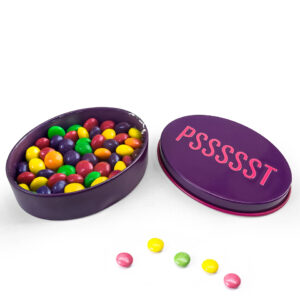 Pocket sized oval tin package for colorful mixed sweets