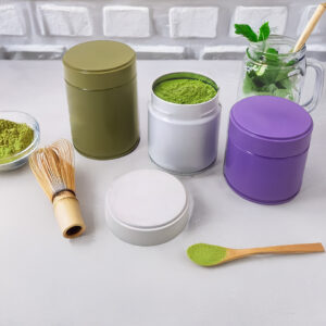 Colorful round metal packaging tins for matcha powder